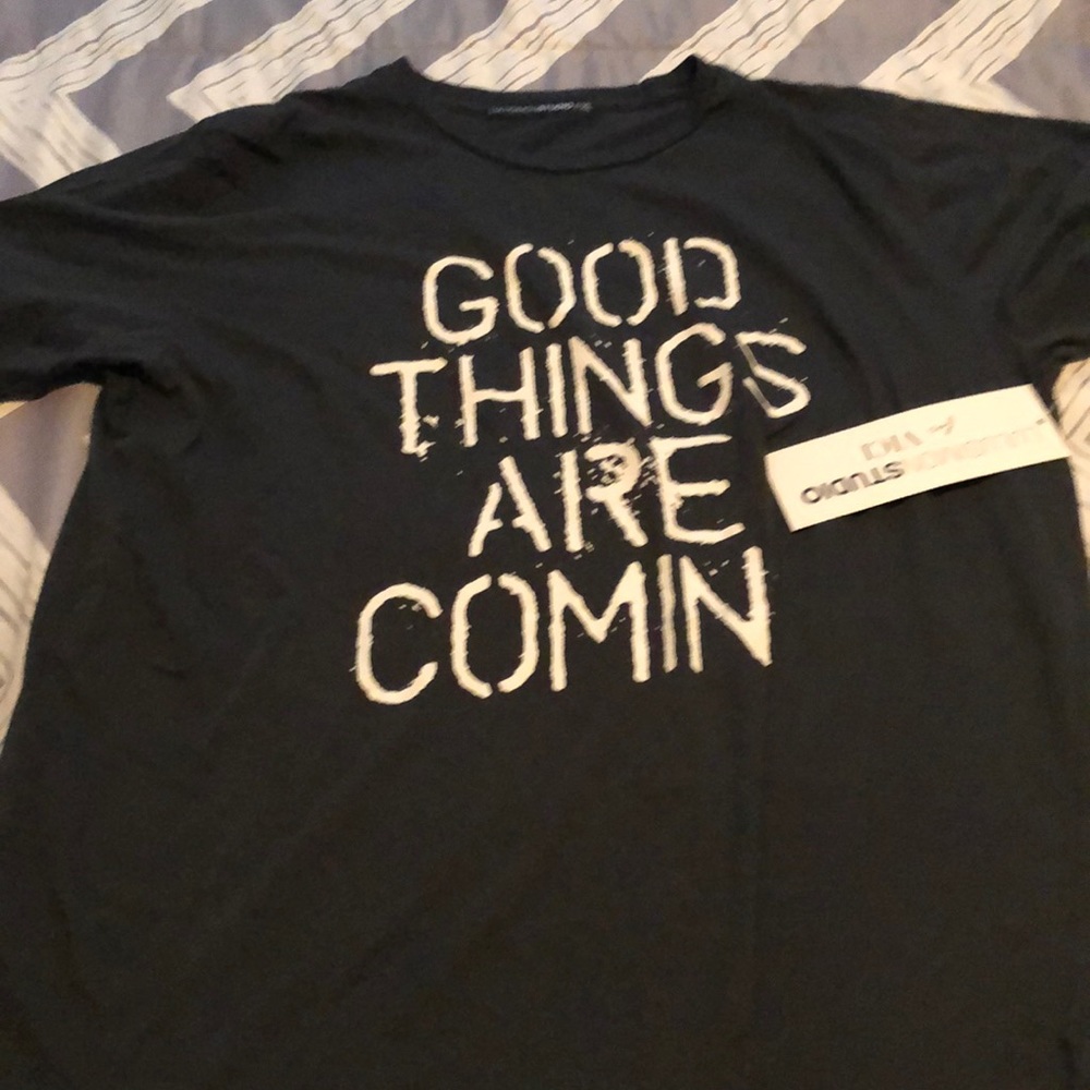Dark grey tee. “Good things are coming”
